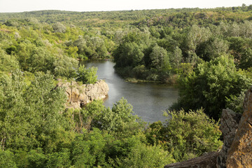 Beautiful lake among trees and rocks