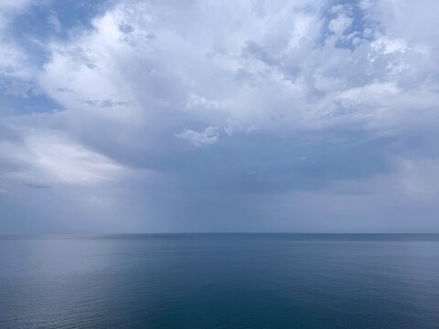 Blue ocean and cloudy sky at morning.