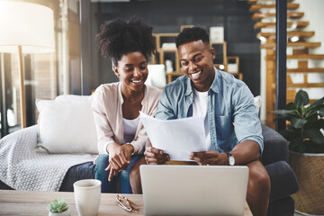 Couple, laptop and happy with paperwork for finance on sofa with planning taxes or success with...