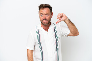 Middle age caucasian man isolated on white background showing thumb down with negative expression