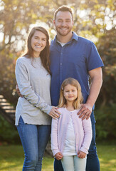 Portrait, family and girl in garden, parents and happiness with love, weekend break and smile. Face, outdoor and mother with father, daughter and cheerful with care, joyful and child in park