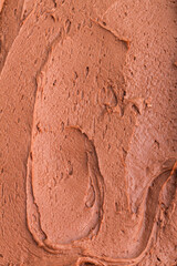 Fototapeta premium Close-up texture of smooth, rich chocolate frosting
