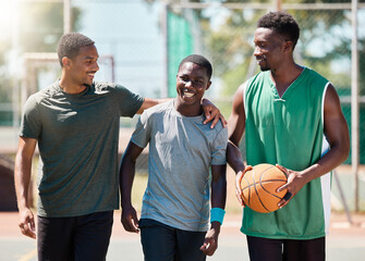 Basketball player, happy friends and walking together in conversation, training or exercise in...