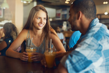 Couple, lunch date and happy in restaurant together, relationship and bonding with healthy drinks in cafe. Commitment, love and conversation on weekend break, trust and loyalty with people or relax