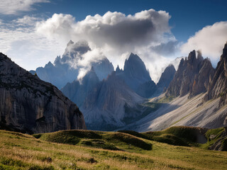 Obraz premium Mountains in the spring with clouds