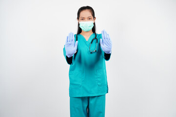 Female nurse stopping isolated background