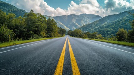View of an expansive road heading towards the Great Smoky Mountains National Park, Tennessee, with scenic mountain and forest views