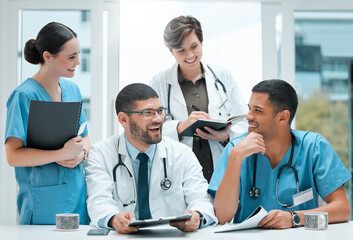 Fototapeta premium Paperwork, teamwork and doctors laughing in meeting for medical diagnosis, discussion or wellness. Joke, happy and people in funny conversation for collaboration, consulting or healthcare service