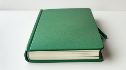 Green notebook isolated with white background and space for text