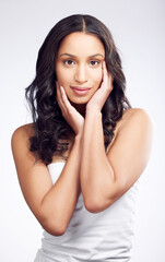 Portrait, hair care and woman with shine, volume and cosmetics on white studio background. Face, person and model with beauty, texture and glow with grooming routine, keratin treatment or dermatology