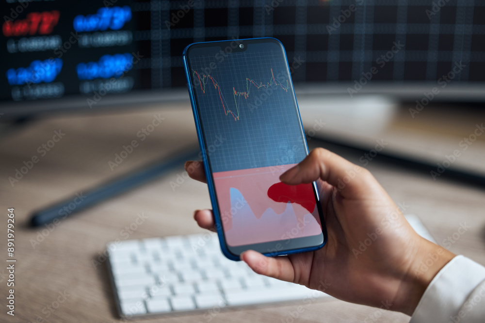 Poster hands, cellphone and graphs on screen for stock market crash, business and trader working in office.