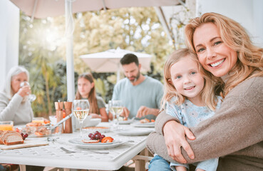 Hug, woman and big family with happiness in backyard for celebration, lunch or bonding together. Grandparents, children and generations with embrace on patio for party, gathering or love at home