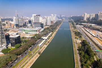 Aerial view of Marginal Pinheiros with the Pinheiros River and modern buildings in Sao Paulo, Brazil.