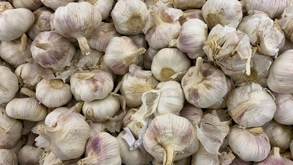 Top view of garlic displayed in supermarket. Healthy food nutrition concept