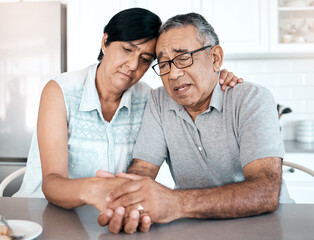 Senior, couple and sad in home with support for grief, compassion or empathy with holding hands....