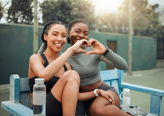 Heart, fitness or portrait of friends in sports on break in outdoor training for workout, exercise or practice. Happy, tennis court or people with support, love or smile for wellness or hand gesture