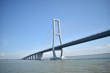 Suramadu Bridge which connects Java Island and Madura Island. This bridge is very famous.
