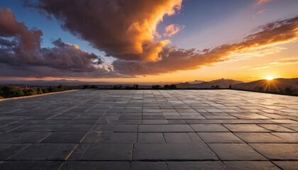 Sunset Over Mountains with Stone Patio.