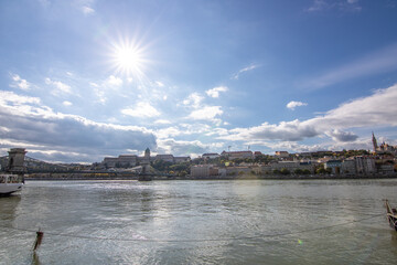 An incredible city view at sunrise or sunset. Extensive city panorama with historical buildings on...