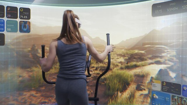 Caucasian woman wearing VR headset exercises on orbitrek simulator. Screen shows scenery background and interface of virtual reality sports application. Metaverse futuristic home gym. VFX animation.