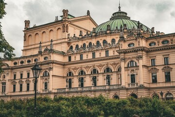Obraz premium Beautiful view of the historic Juliusz Slowacki Theatre in Krakow, Poland on a cloudy day