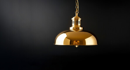 Obraz premium Modern pendant light on a black background, Modern light hanging on black background, Hanging ceiling light, Decorative light