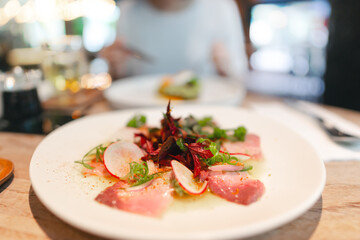 Japanese food Sashimi tuna salad asian foodie woman background at indoor restaurant on day