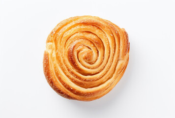 Fototapeta premium A spiral decorates a bread on a white background, its clear and crisp appearance reflecting timeless artistry.