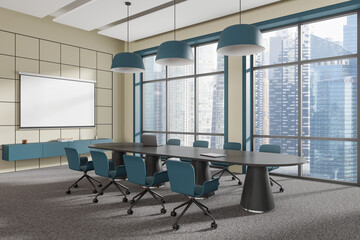 Conference interior with meeting table and projection screen, panoramic window