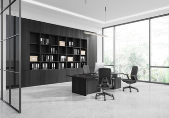 Dark office interior with work table and pc computer, panoramic window