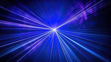 Blue and violet beams of bright laser light shining on black background.
