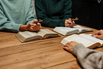 A person reads the Bible, embodying faith and spirituality. The scene reflects a serene moment of contemplation and devotion, highlighting the importance of religion in everyday life.