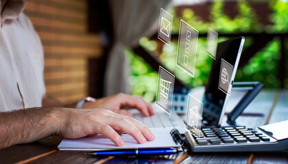 A man adds items to his cart while shopping in a store online. E-commerce marketing offers...