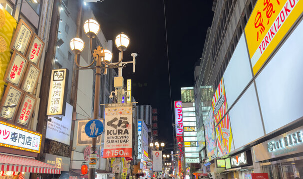 Dotonbori street famous for nightlife, neon light and street food at Namba district, Osaka Japan.