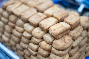 Brown Bandung tofu, ready for sale, showcases its rich color and delicious texture, perfect for adding flavor to any dish