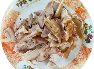 Steamed Pork Ear: A close-up shot of a plate of steamed pork ears, glistening with savory juices and ready to be savored. The delicate texture and rich flavor are evident, making it a perfect image fo