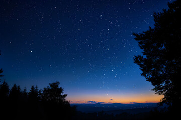 The transition from twilight to night, with the first stars appearing in the sky