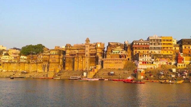 Handheld Shot Of Boat Crossing The Ganges River In Varanasi, India, Panoramic Assi Ghat In Banaras