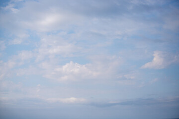 Sky background with clouds. White clouds against a blue sky.