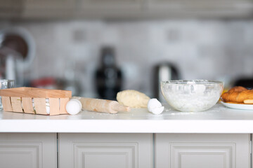 Flat lay composition with fresh ingredients for delicious homemade cake on light grey marble table.