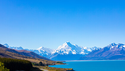 Fototapeta premium Mount Cook landscape with blue on Lake Pukaki, the highest mountain in New Zealand and popular travel destination.