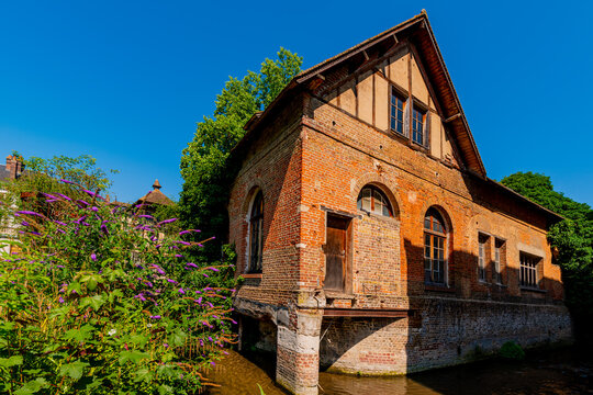 Louviers, France 07 19 2024 : An ancient mill on the river Eure used to make bed sheet 