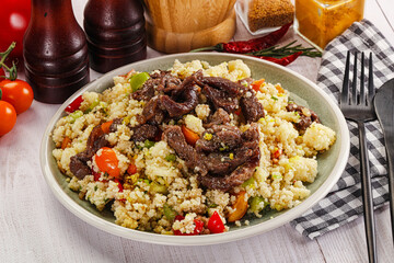 Traditional couscous with beef and vegetables