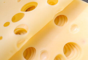 Yellow cheese with holes before serving