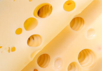 Yellow cheese with holes before serving