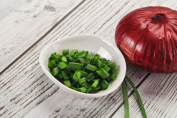 Diced green onion in the bowl