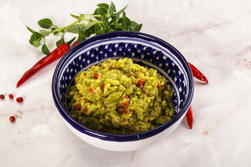 Guacamole with avocado, tomato and chili