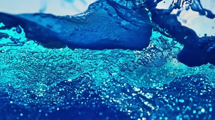 Blue liquid floating. Glitter fluid abstract background. Ink water. Sea wave. Blue color shimmering glowing grain dust mist texture liquid paint splash motion. 4k video