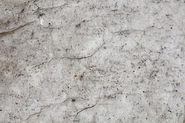 Gray stone wall texture background with rough, grunge surface