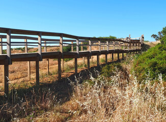 Fototapeta premium Beautiful nature on the ponta da Piedade hike starting at beach praia de dona ana in Lagos on new wooden boardwalks